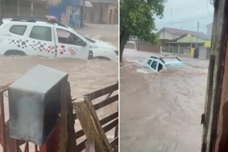 Rua alagada em Martinópolis com viatura da polícia e bombeiros
