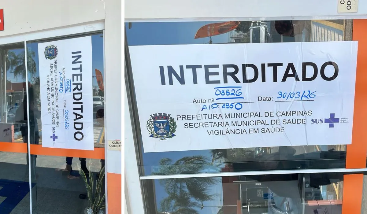 Sinal de interdição da Vigilância Sanitária em clínica odontológica da Faculdade Anhanguera, Campinas.