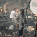 Foto de escombros e prédios destruídos em Beirute, Líbano, simbolizando a crise humanitária