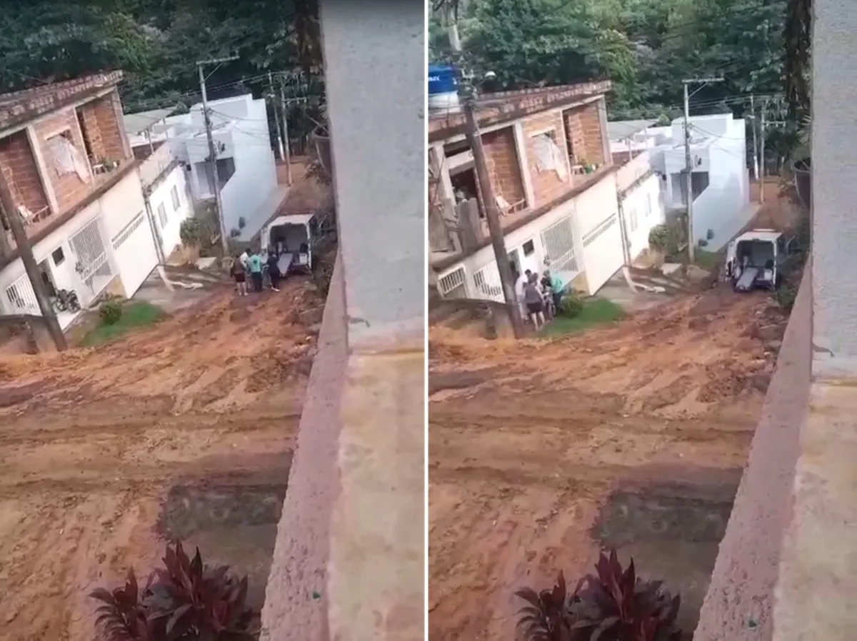 Rua Antônio Ferraz em Itaperuna alagada e escorregadia, impedindo passagem de ambulância