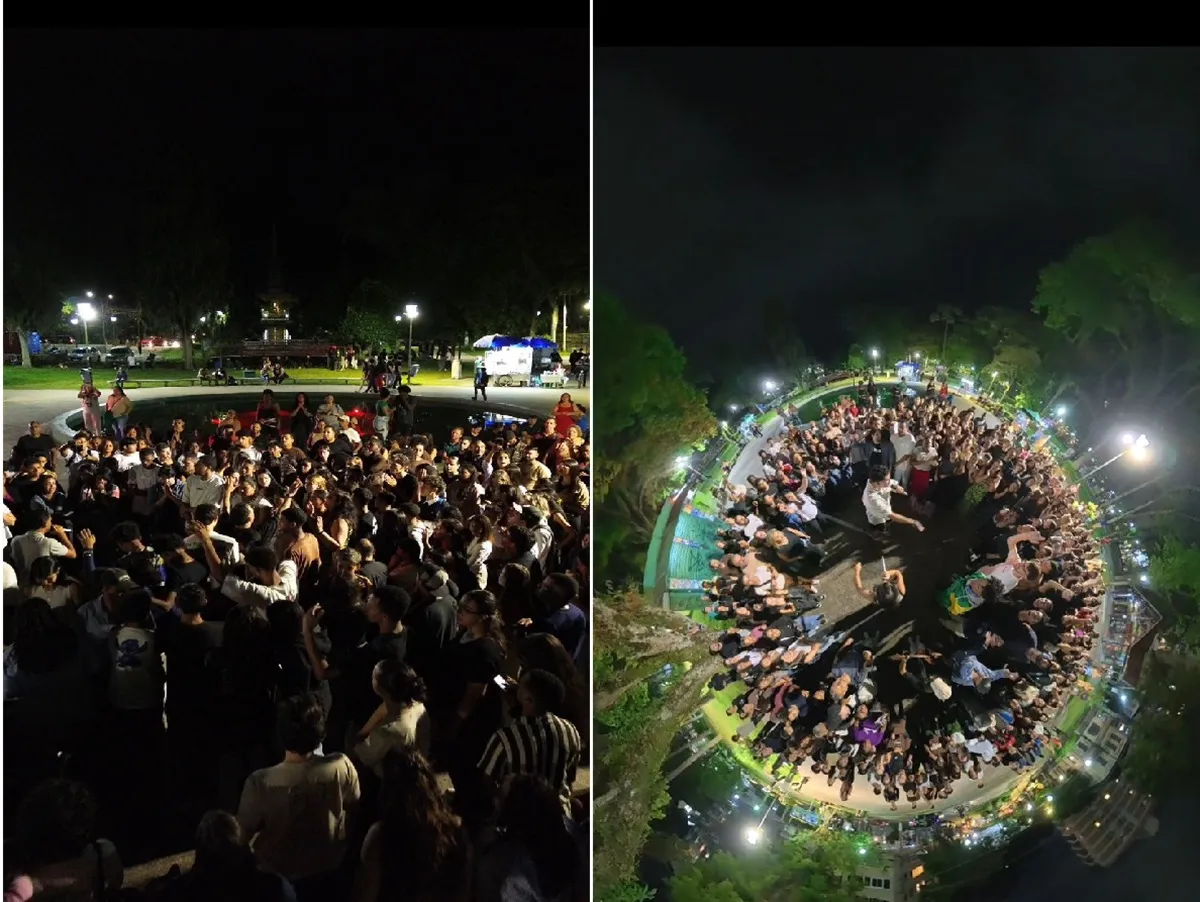 Jovens adorando em evento cristão Som do Alto na Praça da Liberdade Petrópolis