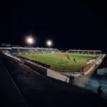 Jogadores do ASA e Confiança em campo disputando a bola em partida da Copa do Nordeste em Arapiraca.