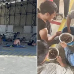 Martelo de juiz sobre documentos, fábrica da BYD ao fundo, simbolizando a decisão judicial sobre a 'lista suja'.