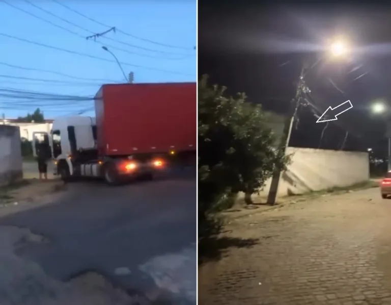 Carreta emaranhada em fios elétricos, poste quebrado, e escuridão em bairro de Campos após apagão.