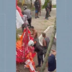 Homens armados invadindo casa de festas para resgatar balão em Marechal Hermes, Rio de Janeiro.