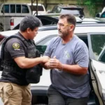 Polícia paraguaia prendendo Marcos Campinha Panissa, assassino brasileiro