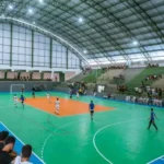 Partida de futsal da Copa TV Asa Branca com jogadores e torcida