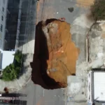 Cratera no Jardim Imperial, São José dos Campos, com equipamentos de obra