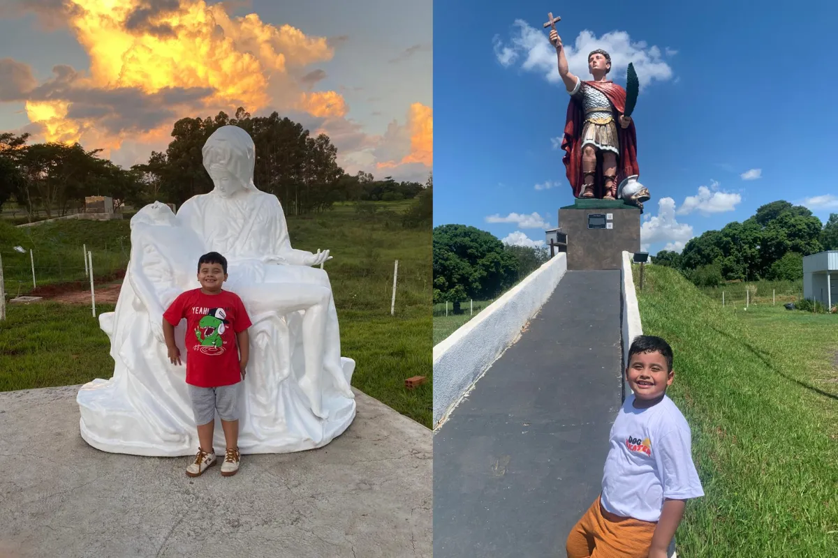 Menino Sérgio Antônio em frente aos santos gigantes no Caminho dos Devotos, interior de São Paulo.