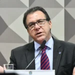 Ministro Luiz Marinho explicando programa de FGTS para quitar dívidas
