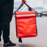 Composição de preços em apps, fiscalização Senacon, transparência de valores em delivery e transporte