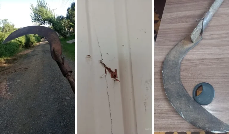 Policial conduzindo homem algemado em rua escura, com luzes de viatura ao fundo, simbolizando prisão por violência doméstica.