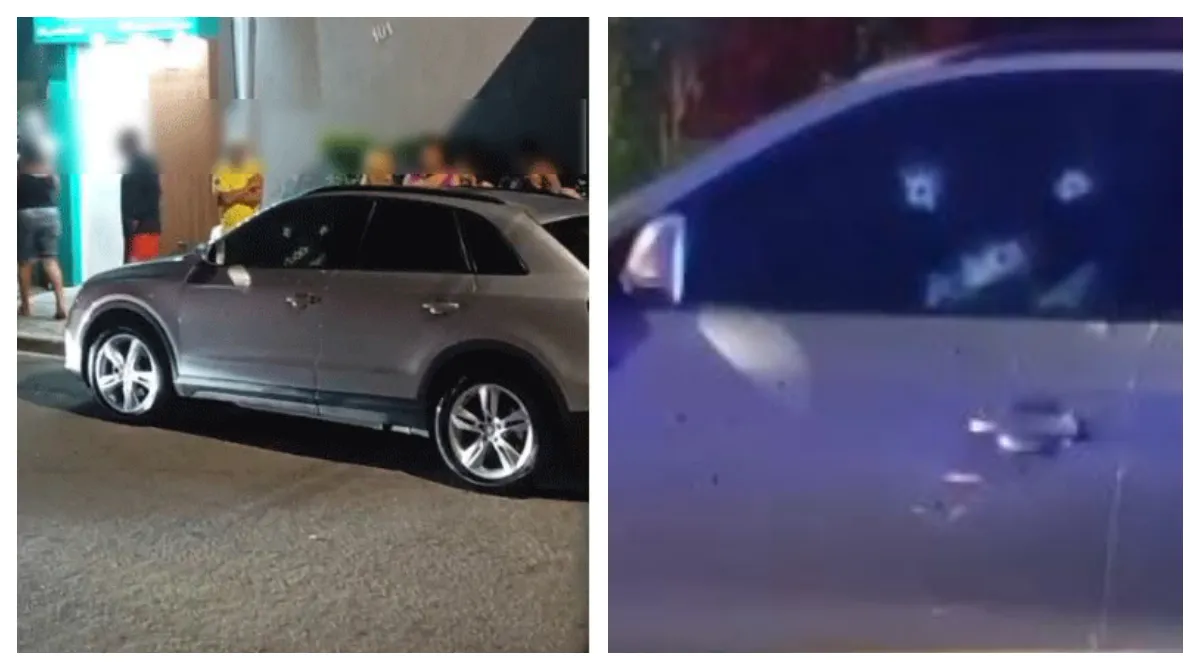 Carro com marcas de tiros em cena de crime noturna em São Paulo, com fita da polícia