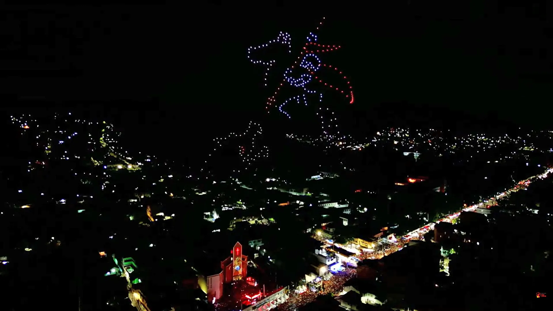 Igreja de São Jorge em Quintino com show de drones e multidão