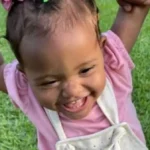 Mãe de bebê Maya, Emanuele Costa, chorando no cemitério