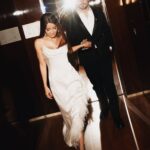 Maiara e Felipe Cavalliere de mãos dadas em hotel de luxo