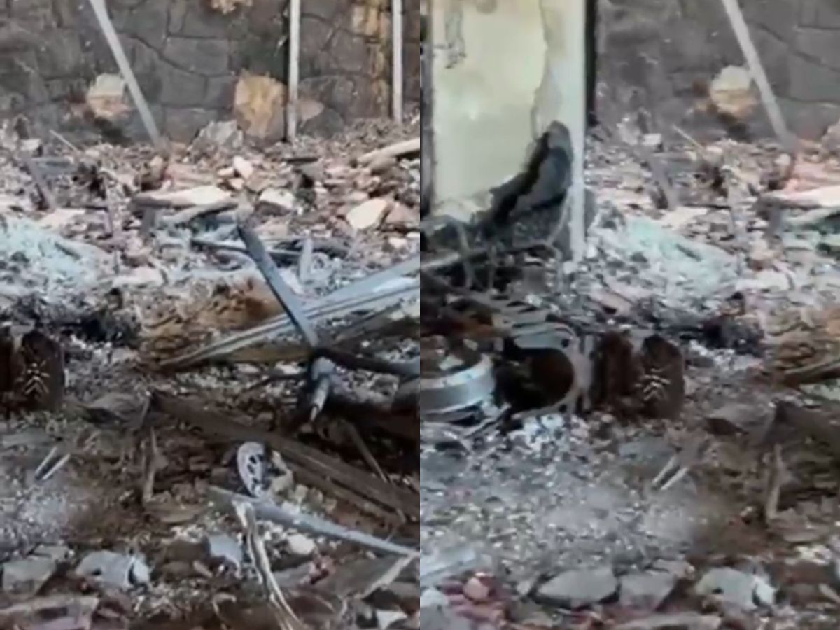 MC Gui em pose pensativa, com leves ferimentos visíveis, ao lado de uma moto elétrica ou em frente a uma casa em reconstrução, simbolizando superação.