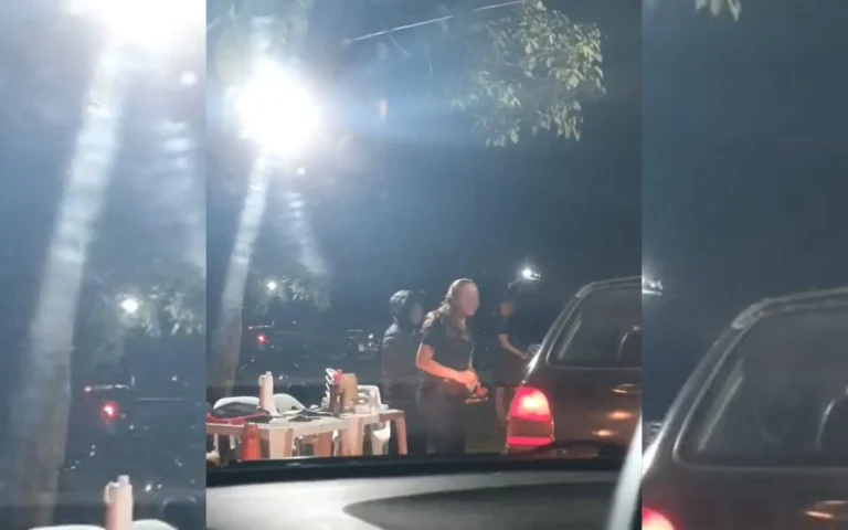 Edifício do Ministério Público à noite, investigação de estacionamento