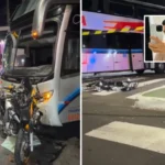 Acidente de moto e ônibus em São Carlos, com isolamento policial e luzes de emergência.