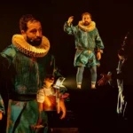 Skyline de São Paulo com teatros e museus iluminados, representando a agenda cultural e os eventos em SP.