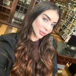 Silhueta feminina e cidade, representando feminicídio de miss Ana Luiza Mateus