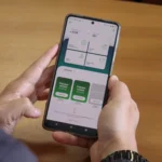 Smartphone exibindo o aplicativo Nota Paraná com notas fiscais e prêmios em dinheiro, representando a participação e ganhos no programa