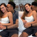 Éder Militão e Tainá Castro sorrindo com a imagem do ultrassom do filho Gabriel