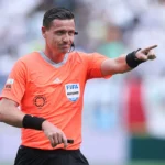 Árbitros brasileiros Raphael Claus, Ramon Abatti Abel e Wilton Pereira Sampaio em campo, representando o Brasil na Copa do Mundo.