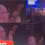 Michael Glantz comendo salada calmamente em meio ao tiroteio