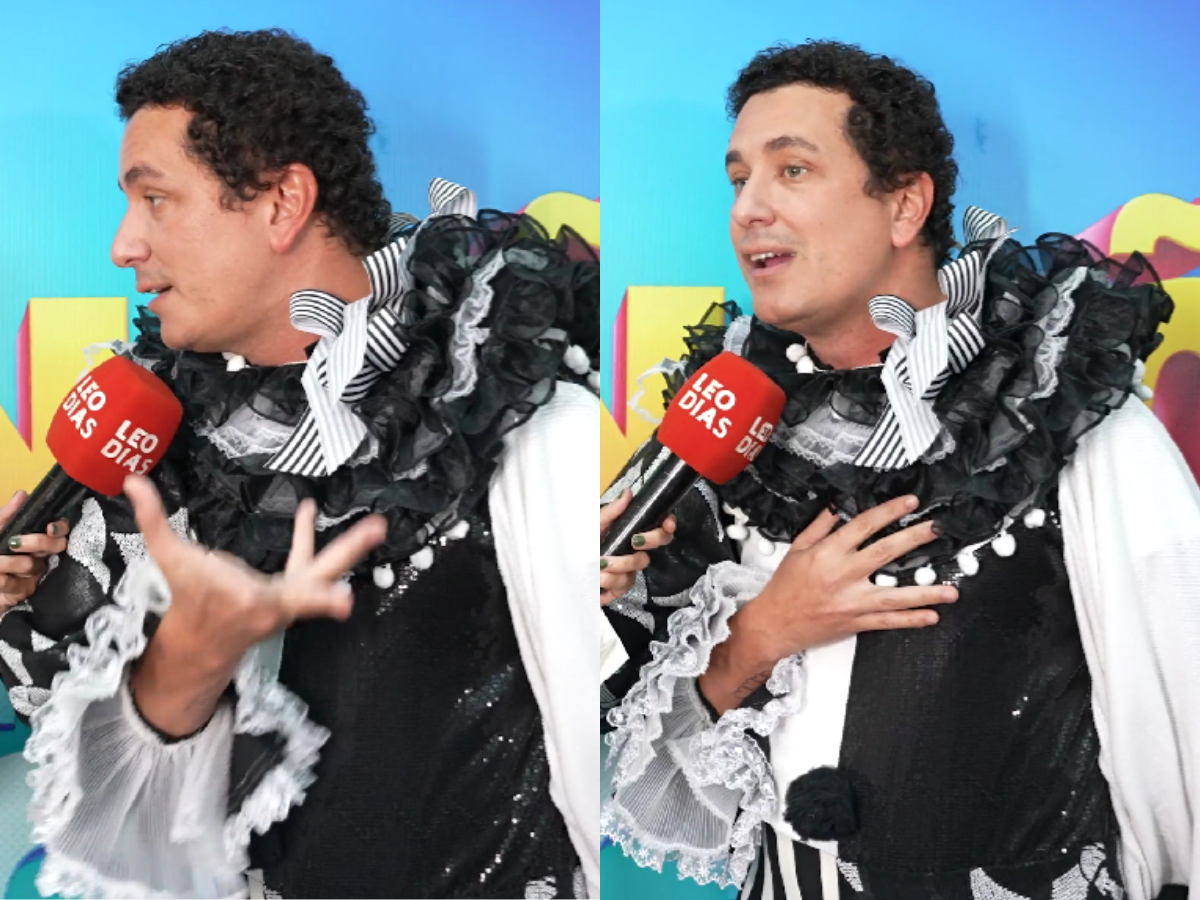 Rafael Portugal com expressão de surpresa, olhando para um celular, simbolizando vazamento de dados.