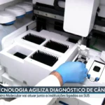Laboratório de diagnóstico molecular de câncer da Unifesp com robô e cientistas