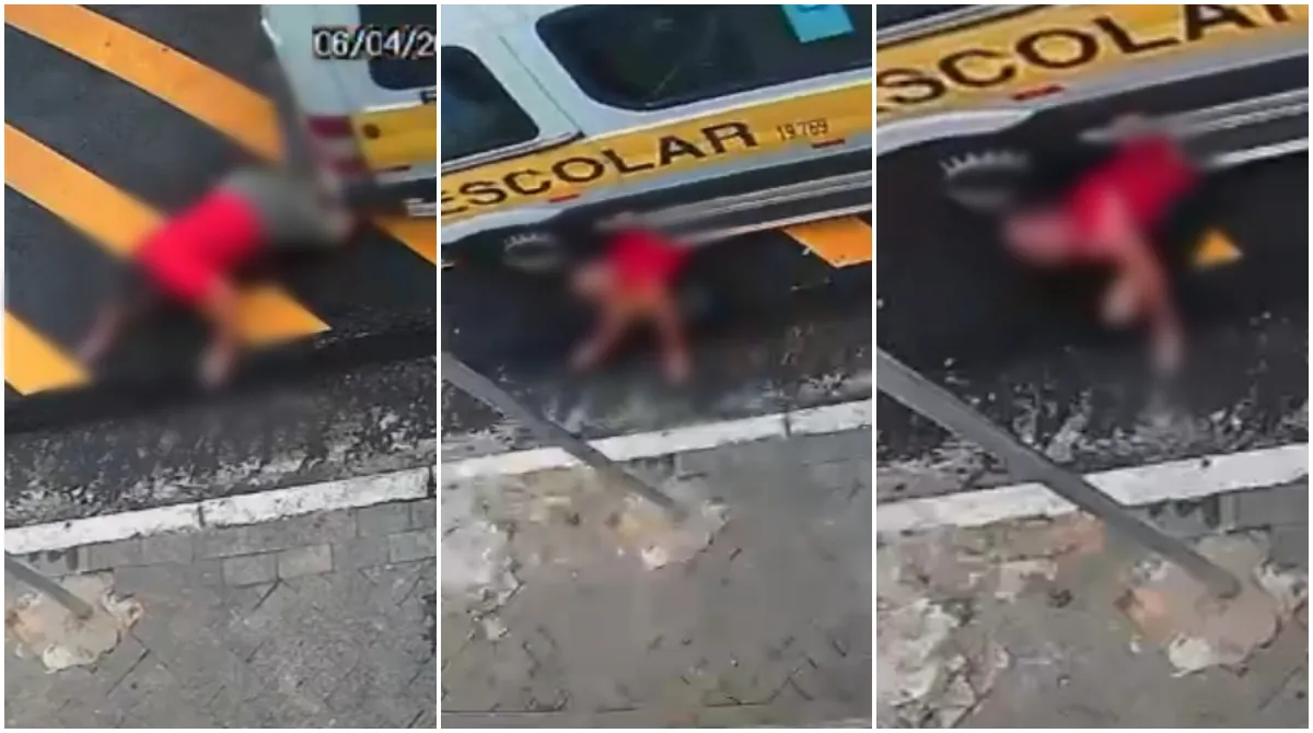 Van escolar branca em rua urbana de São Paulo, capturada por câmera de segurança antes de acidente