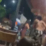 Cena de crime em bar após ataque a tiros em BH com viaturas e policiais
