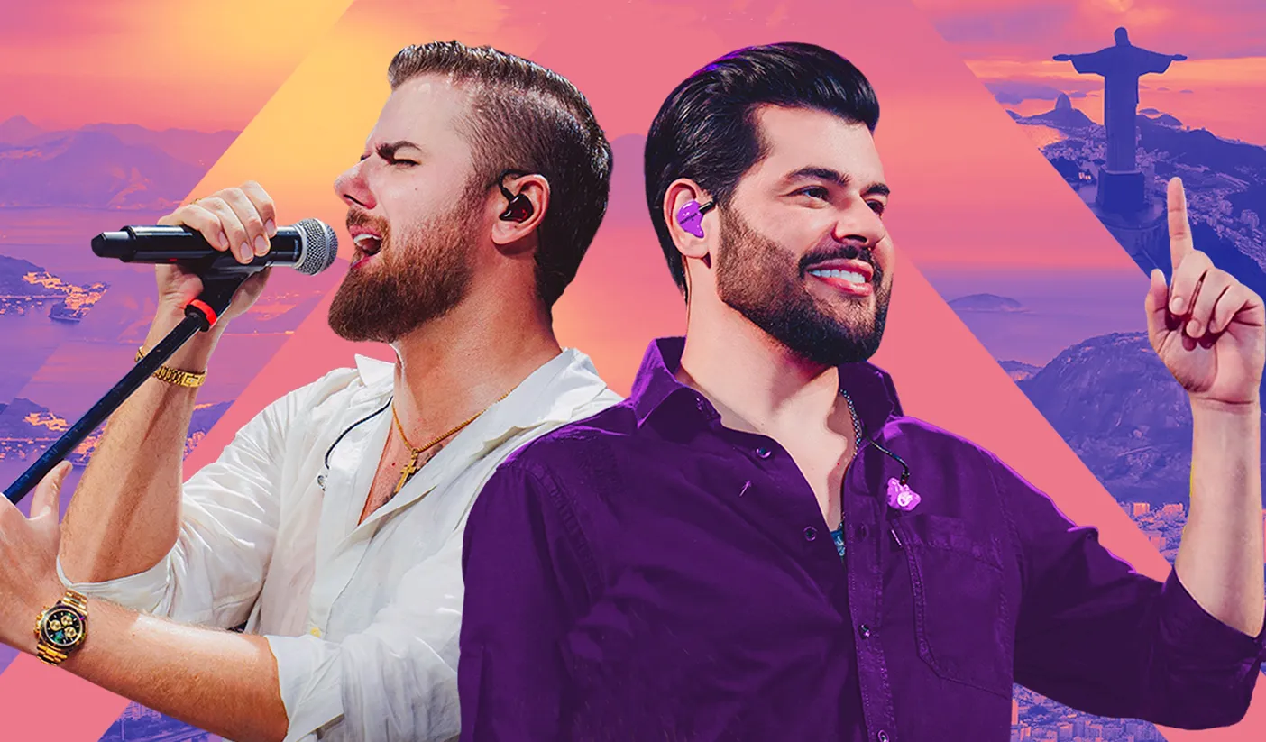 Zé Neto e Cristiano cantando no palco, luzes de show, plateia